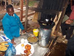 Korogocho residents cooking with Plastic Bags